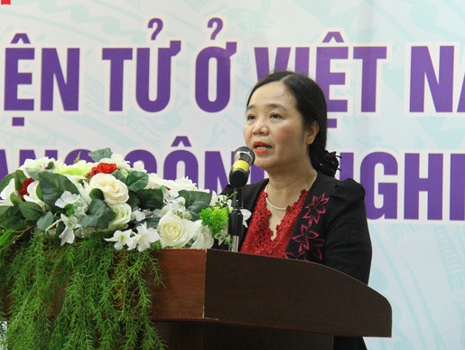 Bà Vũ Dương Thúy Ngà - Vụ trưởng Vụ Thư viện phát biểu khai mạc Hội thảo
